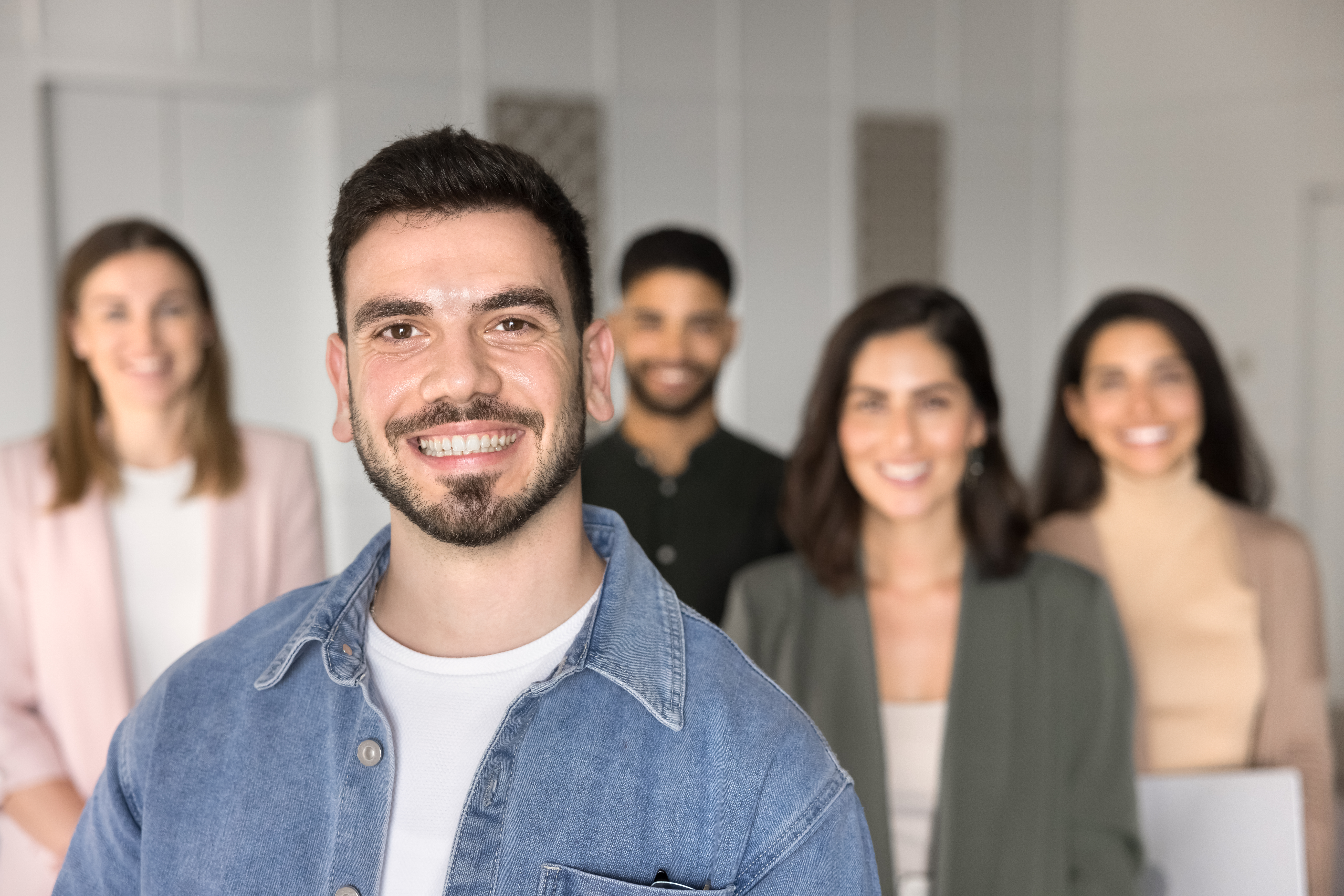 Group of people looking at the camera smiling